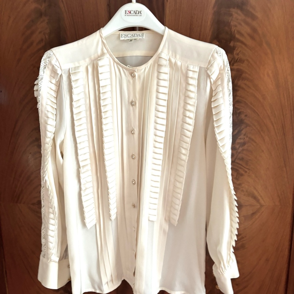 Escada silk blouse. Off white,  lace , rhinestones s golden buttons .